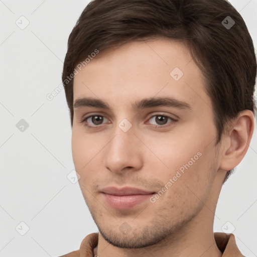 Neutral white young-adult male with short  brown hair and brown eyes