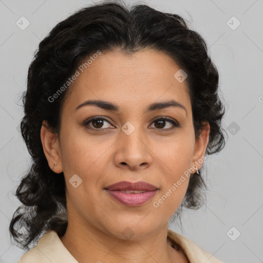 Joyful latino adult female with medium  brown hair and brown eyes