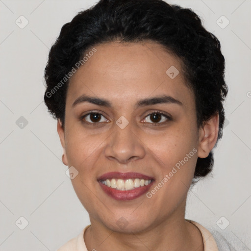 Joyful latino young-adult female with short  brown hair and brown eyes