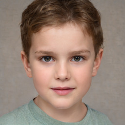 Joyful white child male with short  brown hair and brown eyes