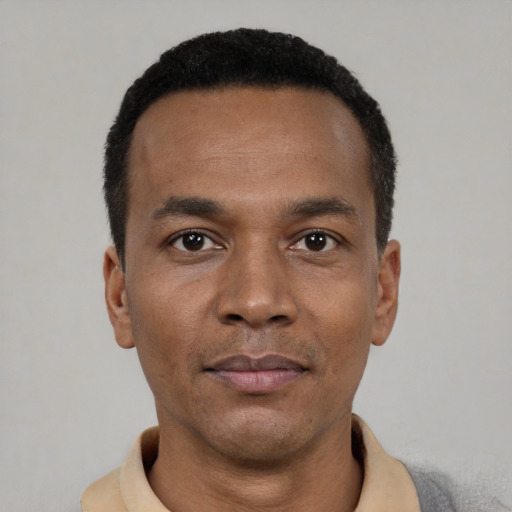 Neutral black young-adult male with short  black hair and brown eyes