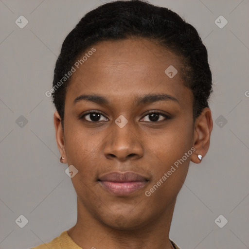 Joyful black young-adult female with short  black hair and brown eyes