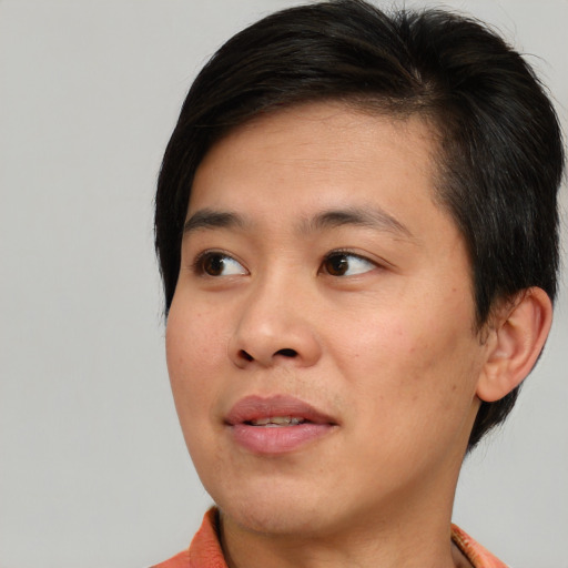 Neutral asian young-adult male with short  brown hair and brown eyes