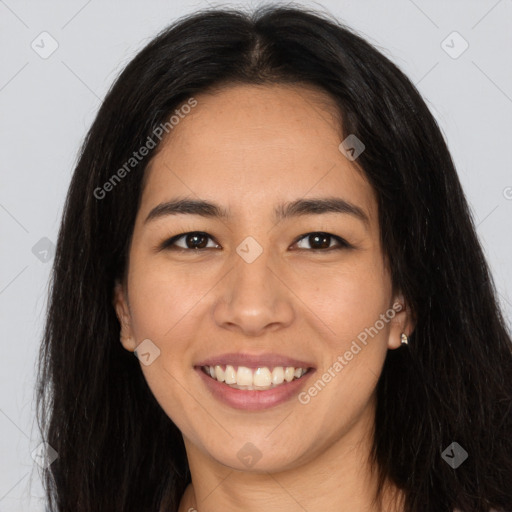 Joyful asian young-adult female with long  brown hair and brown eyes