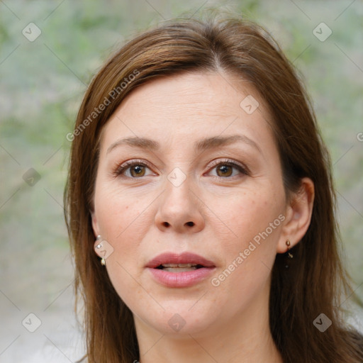 Joyful white adult female with long  brown hair and brown eyes