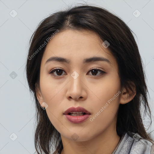 Neutral asian young-adult female with medium  brown hair and brown eyes