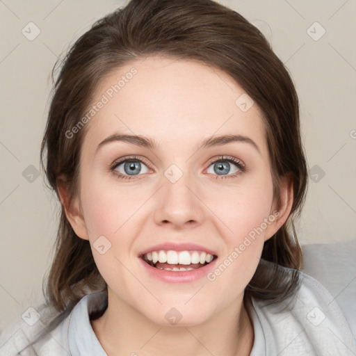 Joyful white young-adult female with medium  brown hair and blue eyes