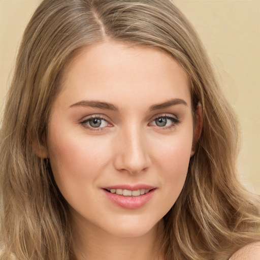 Joyful white young-adult female with medium  brown hair and green eyes