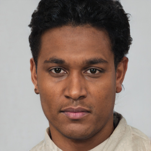 Neutral black young-adult male with short  black hair and brown eyes