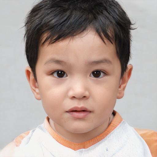 Neutral asian child male with short  brown hair and brown eyes