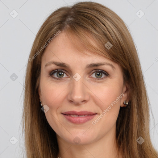 Joyful white adult female with long  brown hair and brown eyes