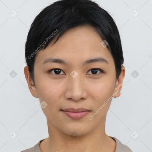 Joyful asian young-adult female with short  black hair and brown eyes