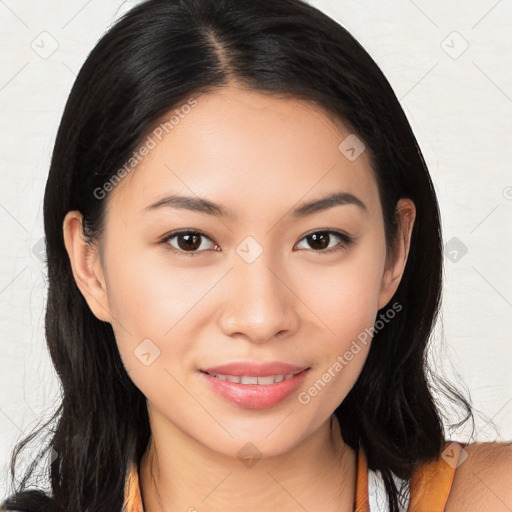 Joyful asian young-adult female with long  brown hair and brown eyes