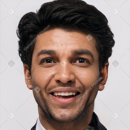 Joyful white young-adult male with short  black hair and brown eyes