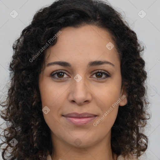 Joyful latino young-adult female with long  brown hair and brown eyes