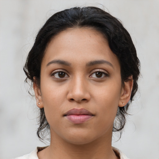 Neutral latino young-adult female with medium  black hair and brown eyes