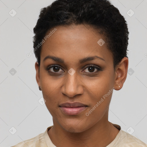 Joyful black young-adult female with short  black hair and brown eyes