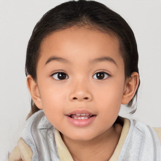 Joyful asian child female with medium  brown hair and brown eyes