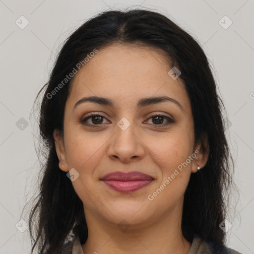 Joyful latino young-adult female with long  brown hair and brown eyes