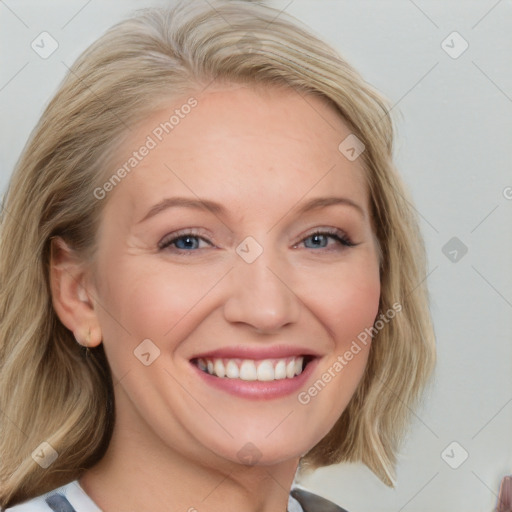 Joyful white young-adult female with medium  brown hair and blue eyes