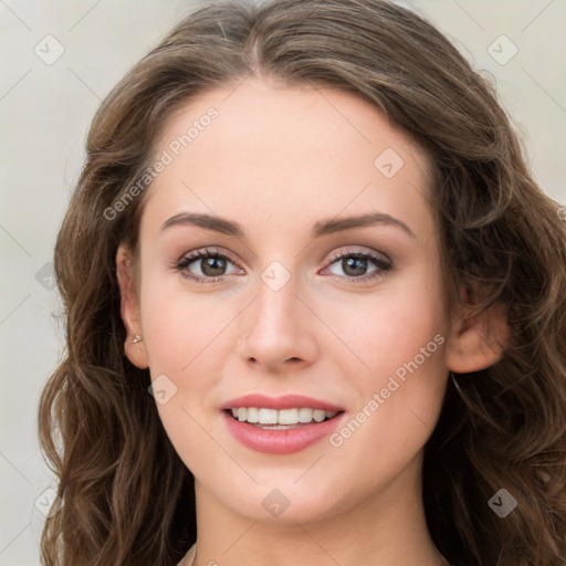 Joyful white young-adult female with long  brown hair and green eyes