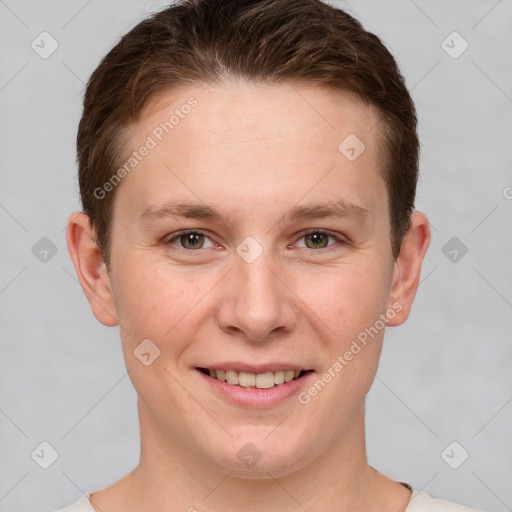 Joyful white young-adult female with short  brown hair and grey eyes