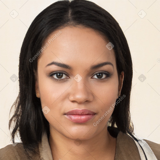 Joyful latino young-adult female with long  brown hair and brown eyes