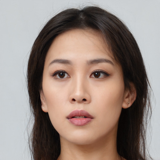 Neutral asian young-adult female with long  brown hair and brown eyes