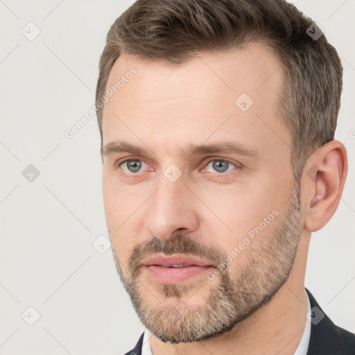 Neutral white adult male with short  brown hair and brown eyes