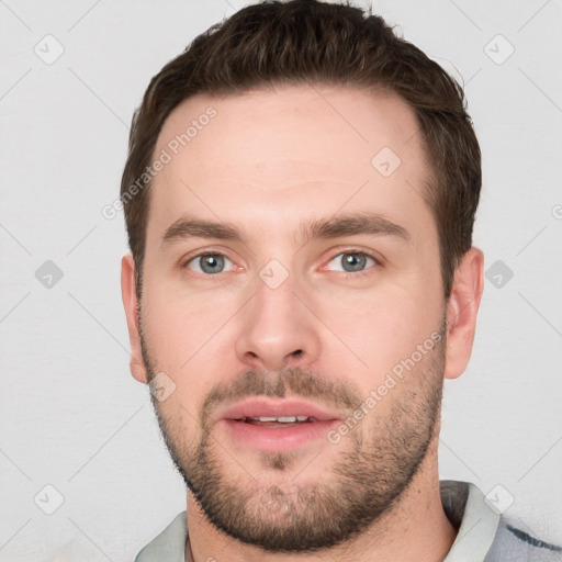 Neutral white young-adult male with short  brown hair and grey eyes