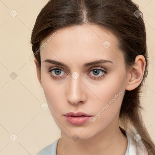 Neutral white young-adult female with medium  brown hair and brown eyes