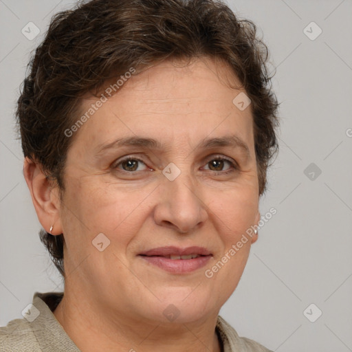 Joyful white adult female with short  brown hair and brown eyes