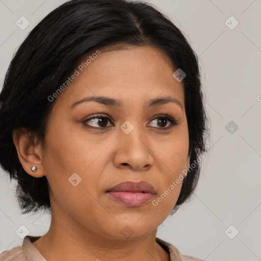 Joyful latino young-adult female with medium  brown hair and brown eyes