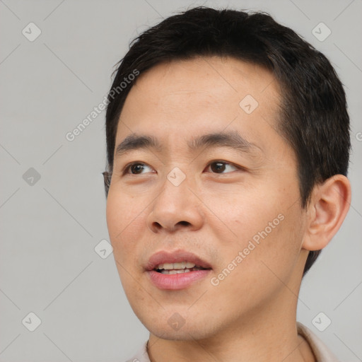 Neutral asian young-adult male with short  black hair and brown eyes