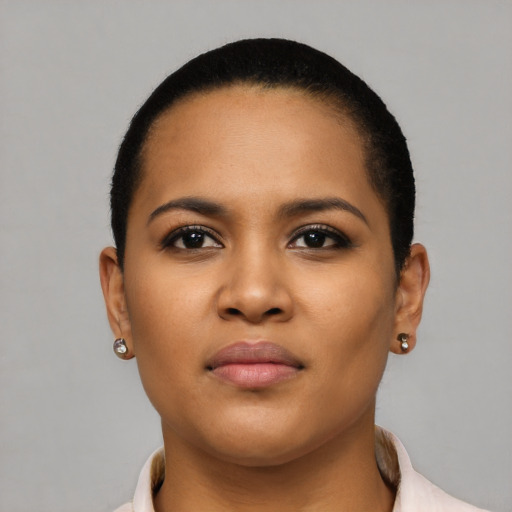 Neutral latino young-adult female with short  brown hair and brown eyes