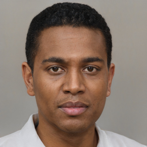 Neutral black young-adult male with short  brown hair and brown eyes