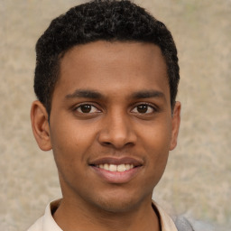 Joyful latino young-adult male with short  brown hair and brown eyes