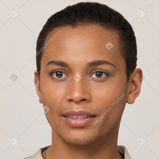 Joyful black young-adult female with short  brown hair and brown eyes