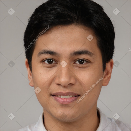 Joyful asian young-adult male with short  black hair and brown eyes