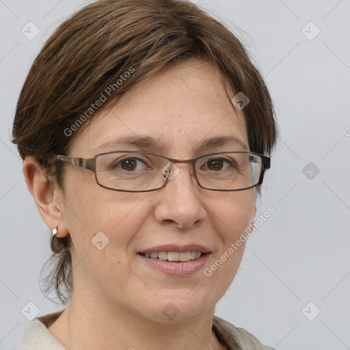 Joyful white adult female with medium  brown hair and grey eyes