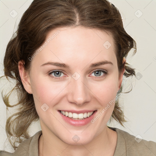 Joyful white young-adult female with medium  brown hair and green eyes