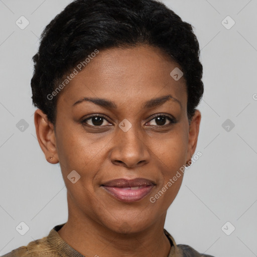 Joyful black young-adult female with short  brown hair and brown eyes