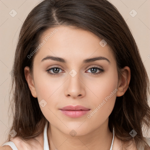 Neutral white young-adult female with long  brown hair and brown eyes