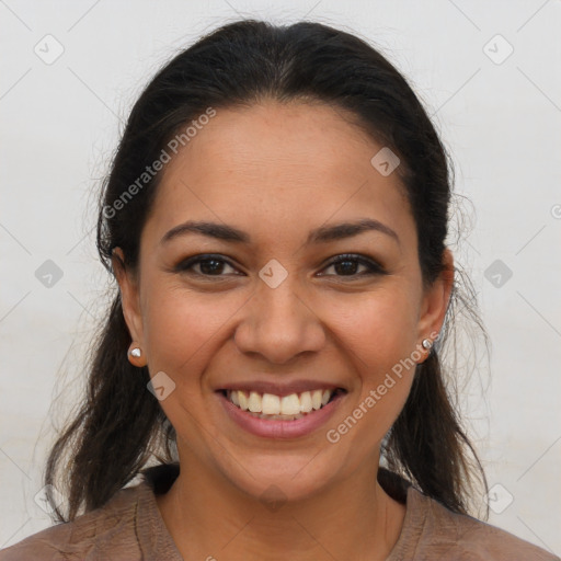 Joyful latino young-adult female with long  brown hair and brown eyes