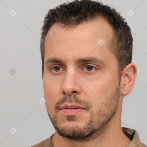 Neutral white young-adult male with short  brown hair and brown eyes