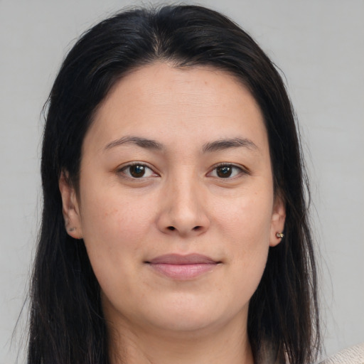 Joyful asian young-adult female with medium  brown hair and brown eyes