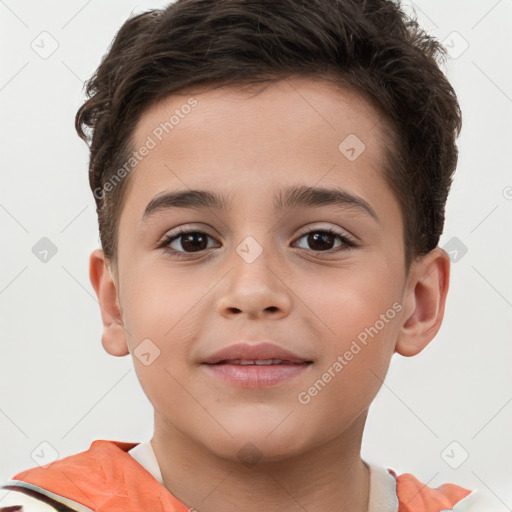 Joyful white child male with short  brown hair and brown eyes