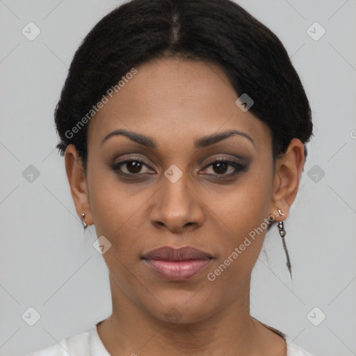 Joyful latino young-adult female with short  brown hair and brown eyes
