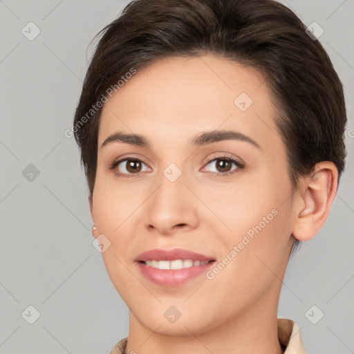 Joyful white young-adult female with short  brown hair and brown eyes