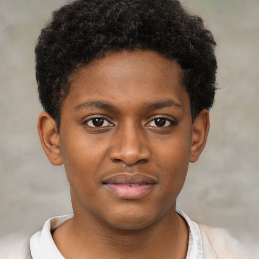 Joyful black young-adult male with short  brown hair and brown eyes